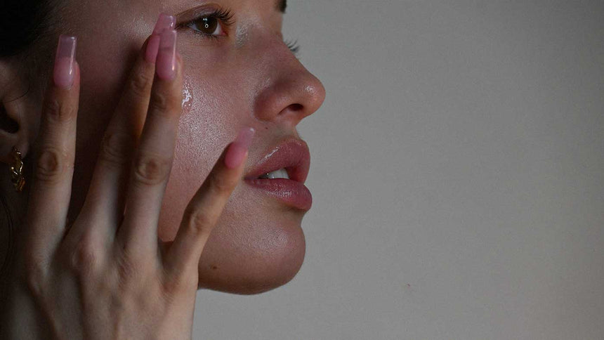 woman applying serum